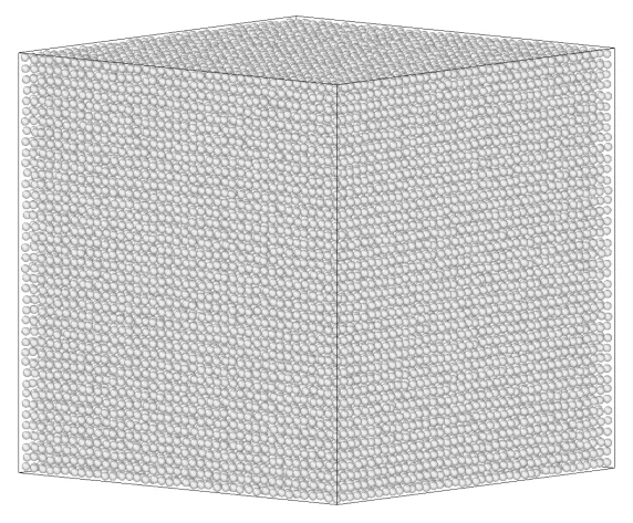 A box of hard spheres settling under gravity: a regular lattice at first, then layers of green and red crystal growing at the bottom under a gray fluid
